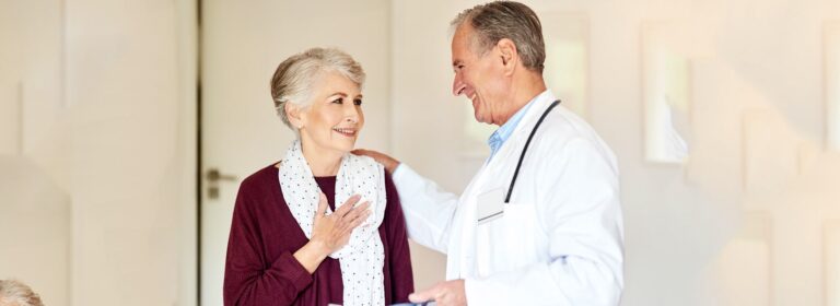 old lady consulting with doctor